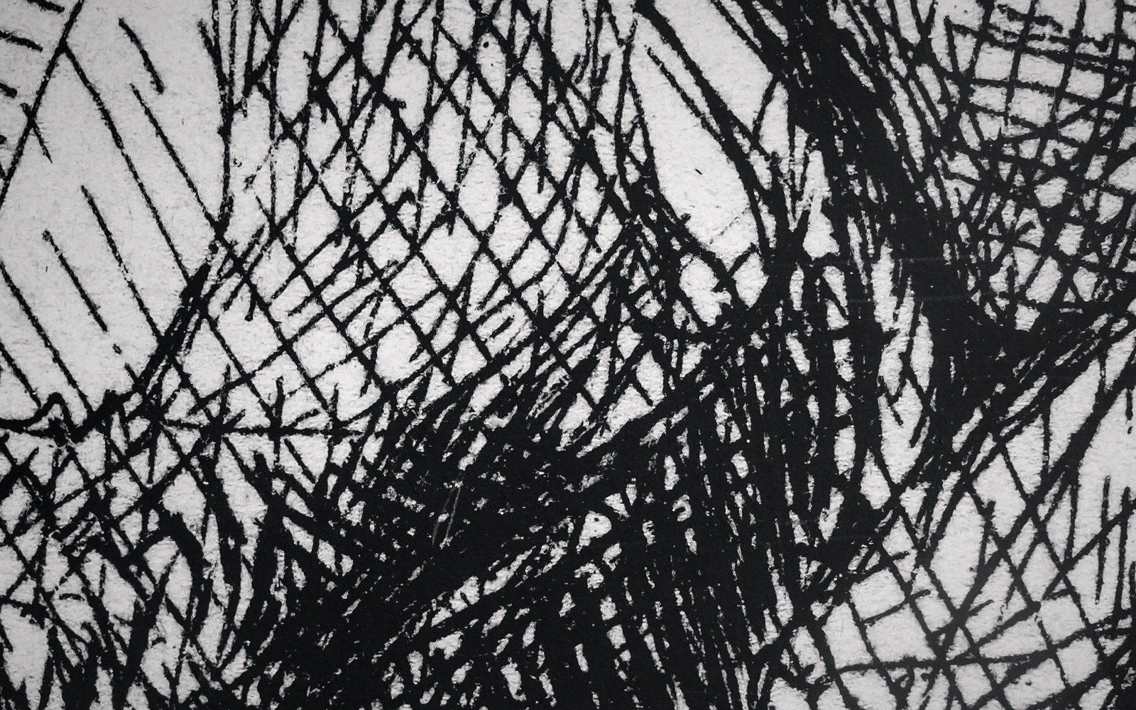 Dense crosshatched ink lines create a chaotic black and white abstract texture